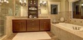 The sumptuous 5-piece master bath showcases marble floors, an ai
